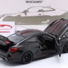 BMW M4 CSL (G82) Baujahr 2023 schwarz 1:18 Minichamps