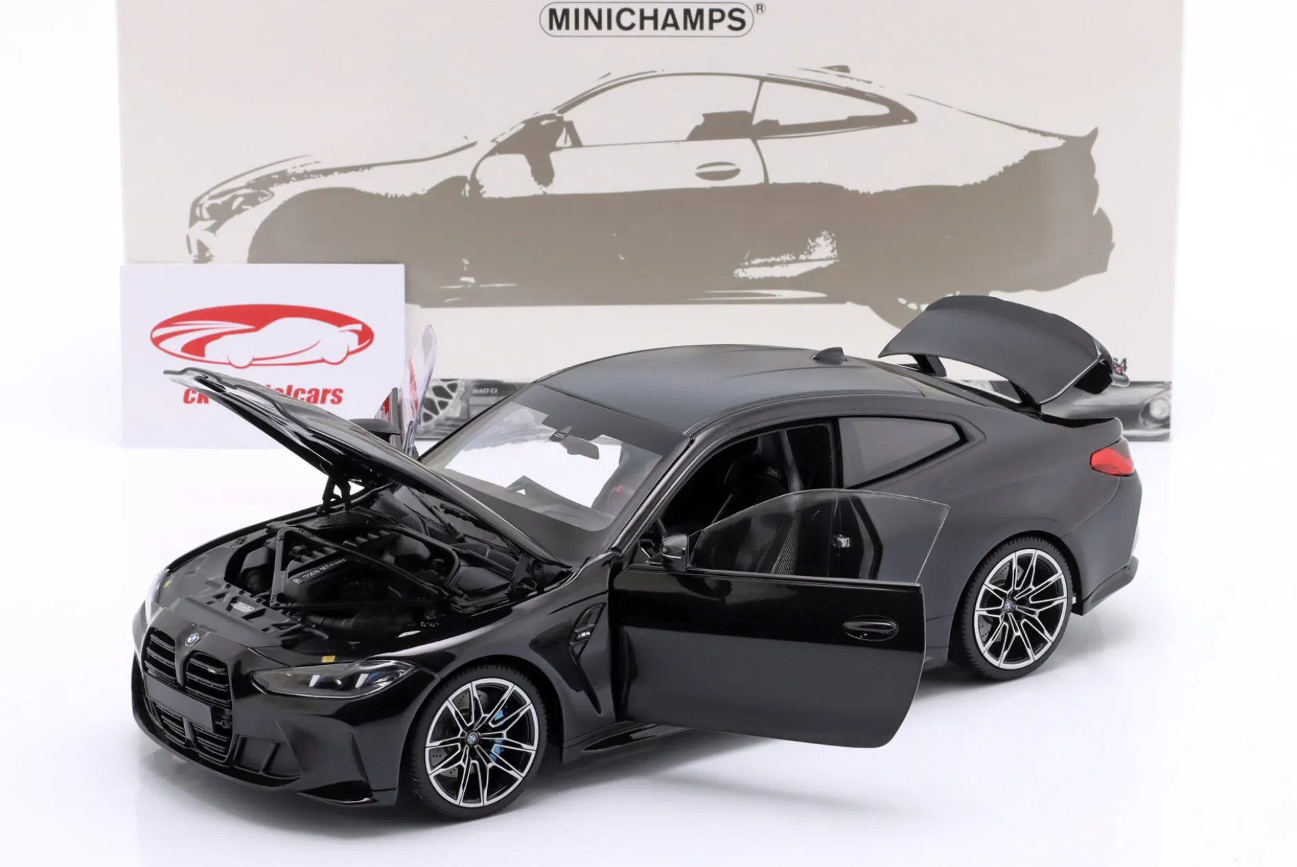BMW M4 (G82) Baujahr 2024 schwarz metallic 1:18 Minichamps