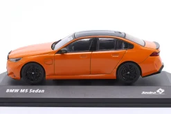 BMW M5 Sedan Baujahr 2024 feuerorange 1:43 Solido