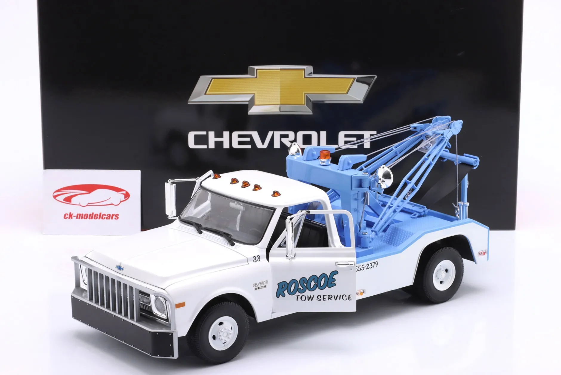 Chevrolet C-30 Abschleppwagen Roscoe Tow Service 1969 weiß / blau 1:18 Greenlight