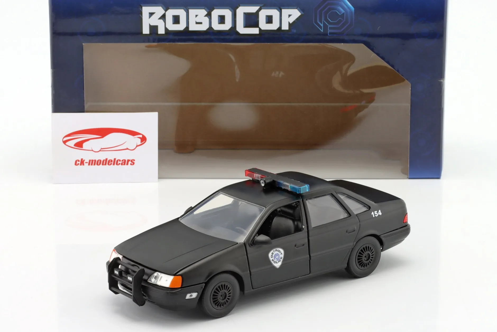 Ford Taurus OCP Baujahr 1986 Movie Robocop (1987) mit Figur 1:24 Jada Toys