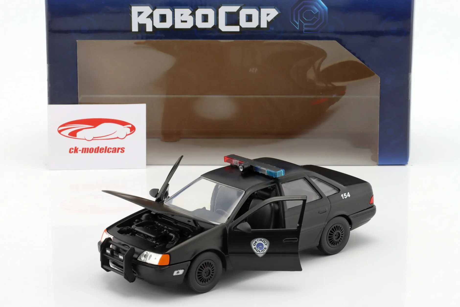 Ford Taurus OCP Baujahr 1986 Movie Robocop (1987) mit Figur 1:24 Jada Toys