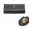 Leder-Schlüsselanhänger Porsche Wappen oakgrün