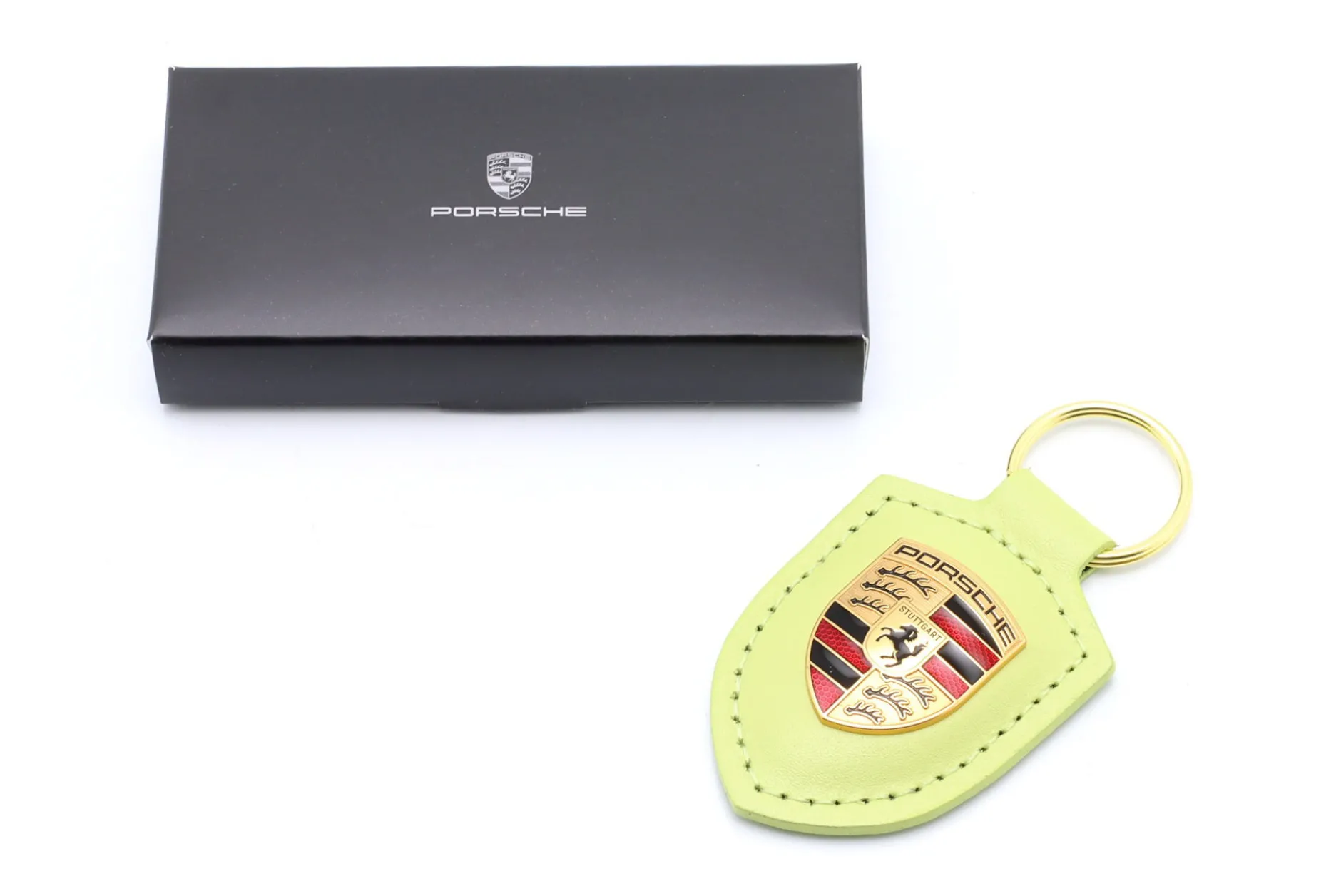 Leder-Schlüsselanhänger Porsche Wappen cartagenagelb metallic