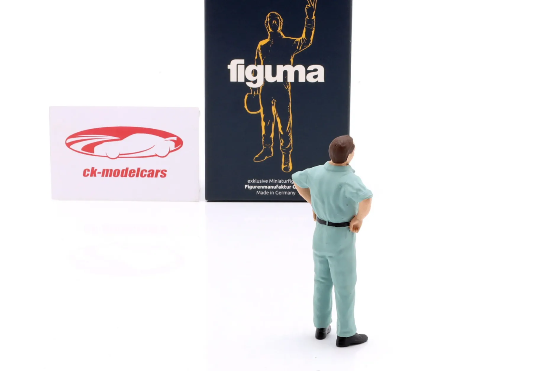 Mechaniker mit blauem Overall skeptisch - Figur 1:18 Figurenmanufaktur