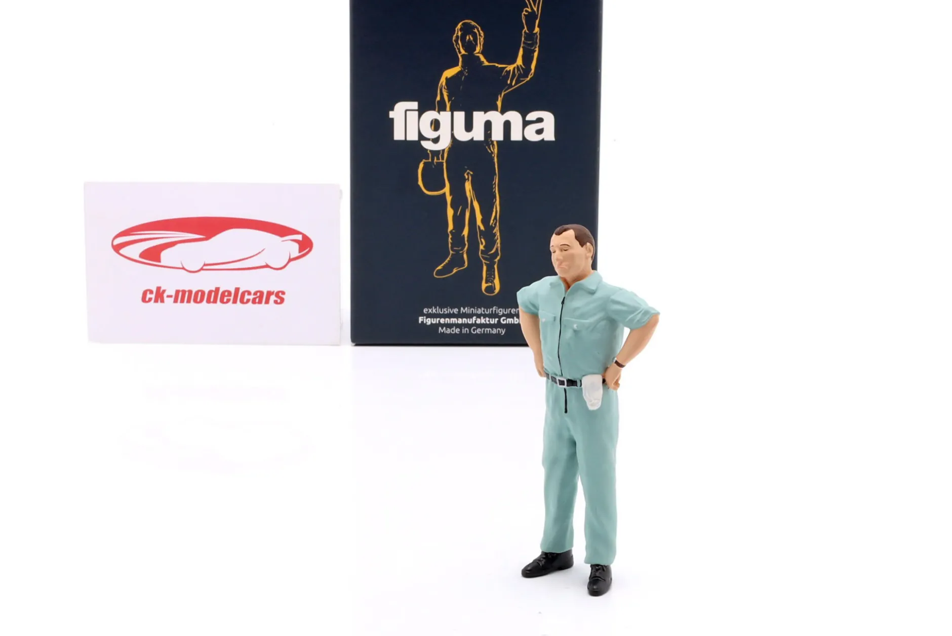 Mechaniker mit blauem Overall skeptisch - Figur 1:18 Figurenmanufaktur