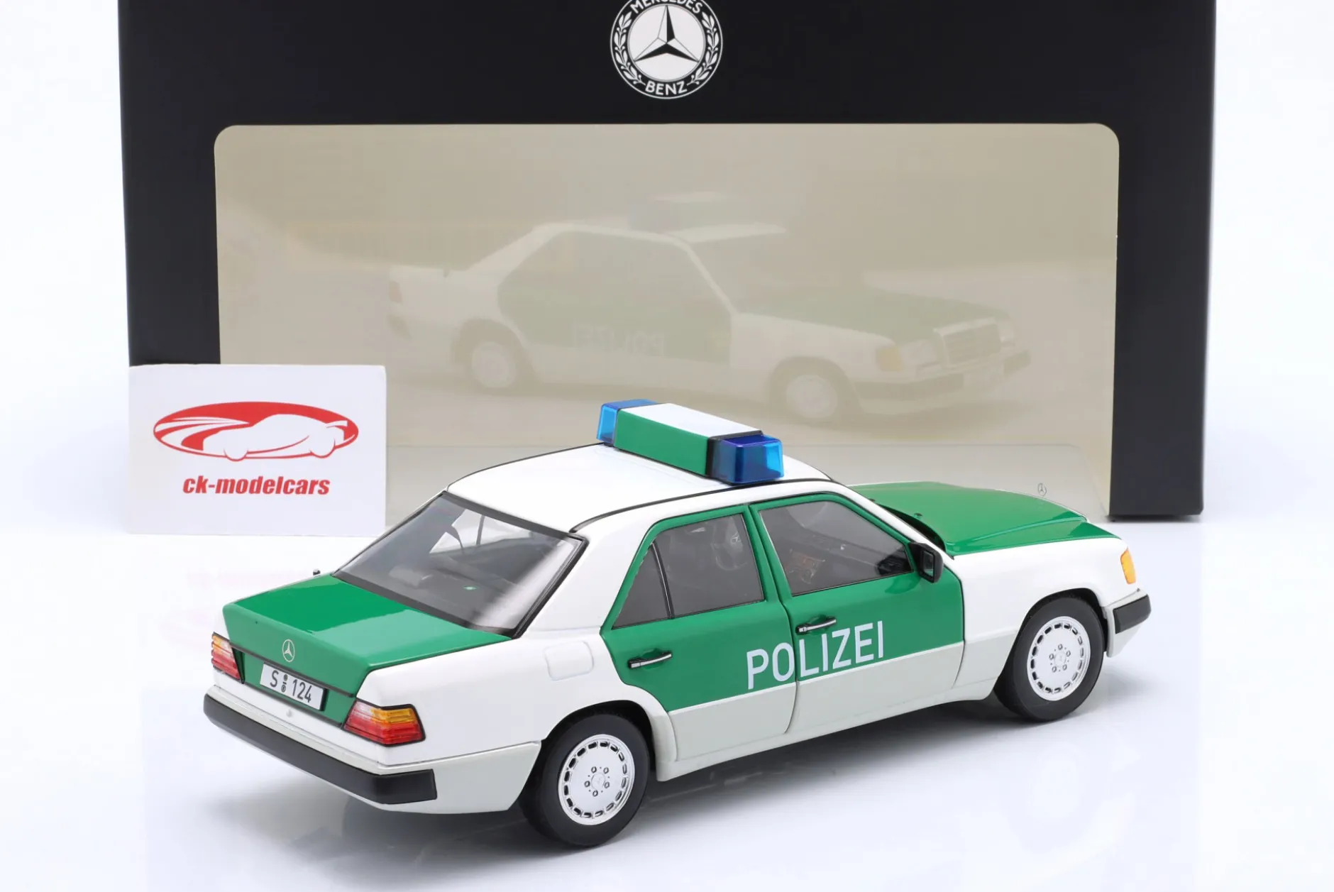 Mercedes-Benz 230E (W124) Polizei Baujahr 1989-1993 weiß / grün 1:18 Norev