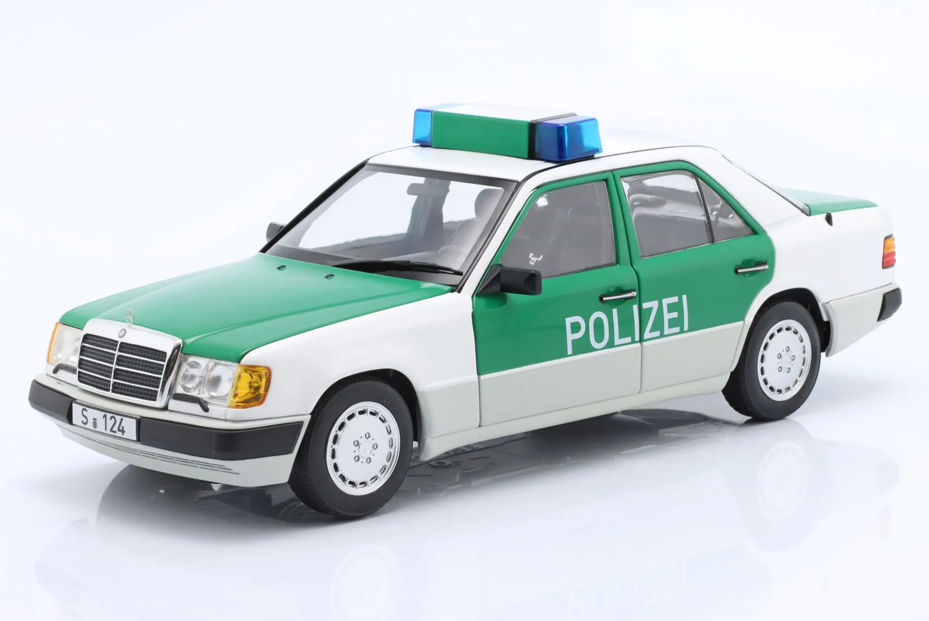 Mercedes-Benz 230E (W124) Polizei Baujahr 1989-1993 weiß / grün 1:18 Norev
