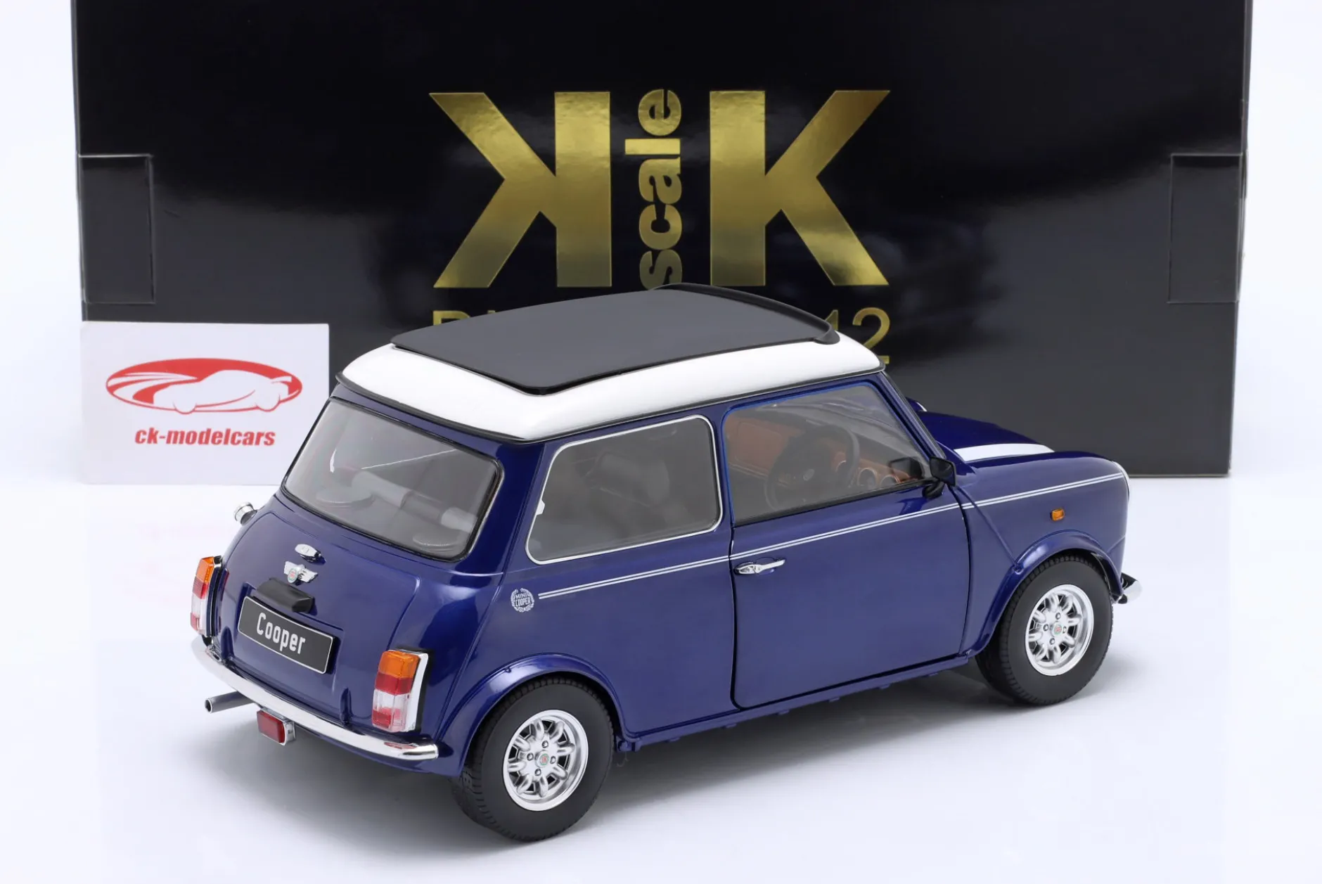 Mini Cooper mit Schiebedach blau metallic / weiß RHD 1:12 KK-Scale
