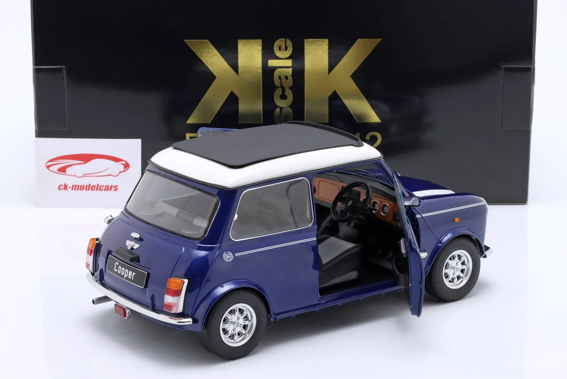 Mini Cooper mit Schiebedach blau metallic / weiß RHD 1:12 KK-Scale
