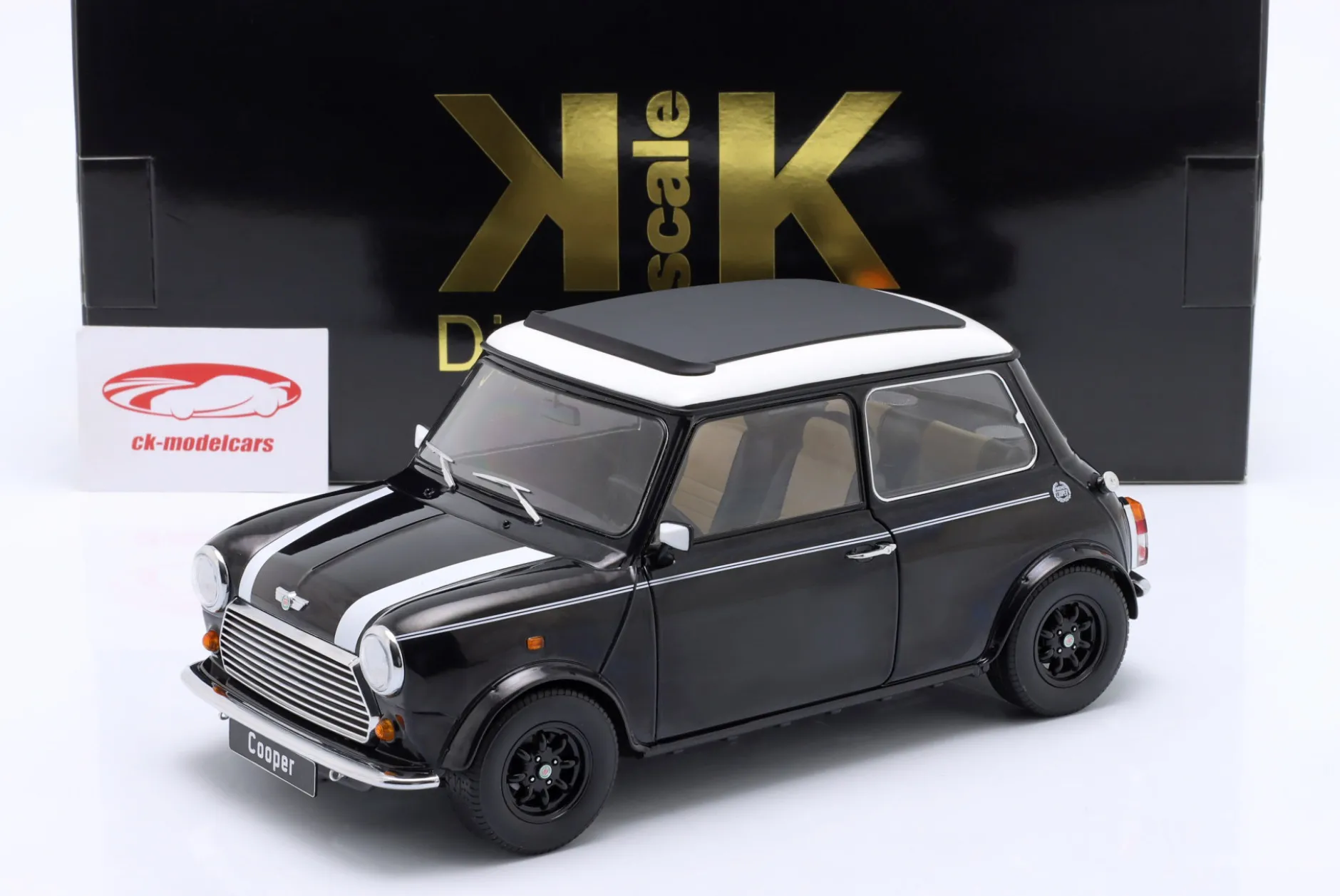 Mini Cooper mit Schiebedach schwarz metallic / weiß LHD 1:12 KK-Scale