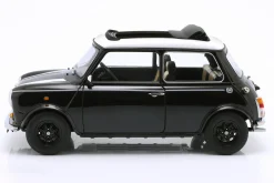 Mini Cooper mit Schiebedach schwarz metallic / weiß RHD 1:12 KK-Scale