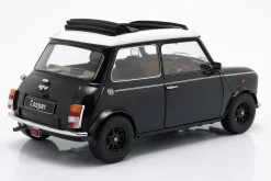 Mini Cooper mit Schiebedach schwarz metallic / weiß RHD 1:12 KK-Scale