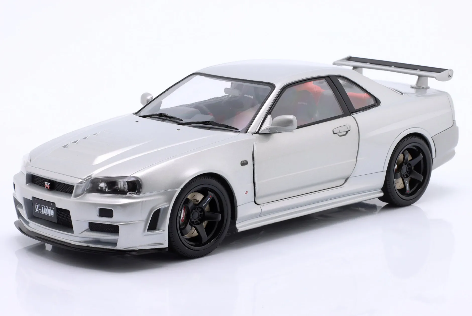 Nissan Skyline GT-R (BNR34) Z-Tune Baujahr 1999 silber 1:18 Solido