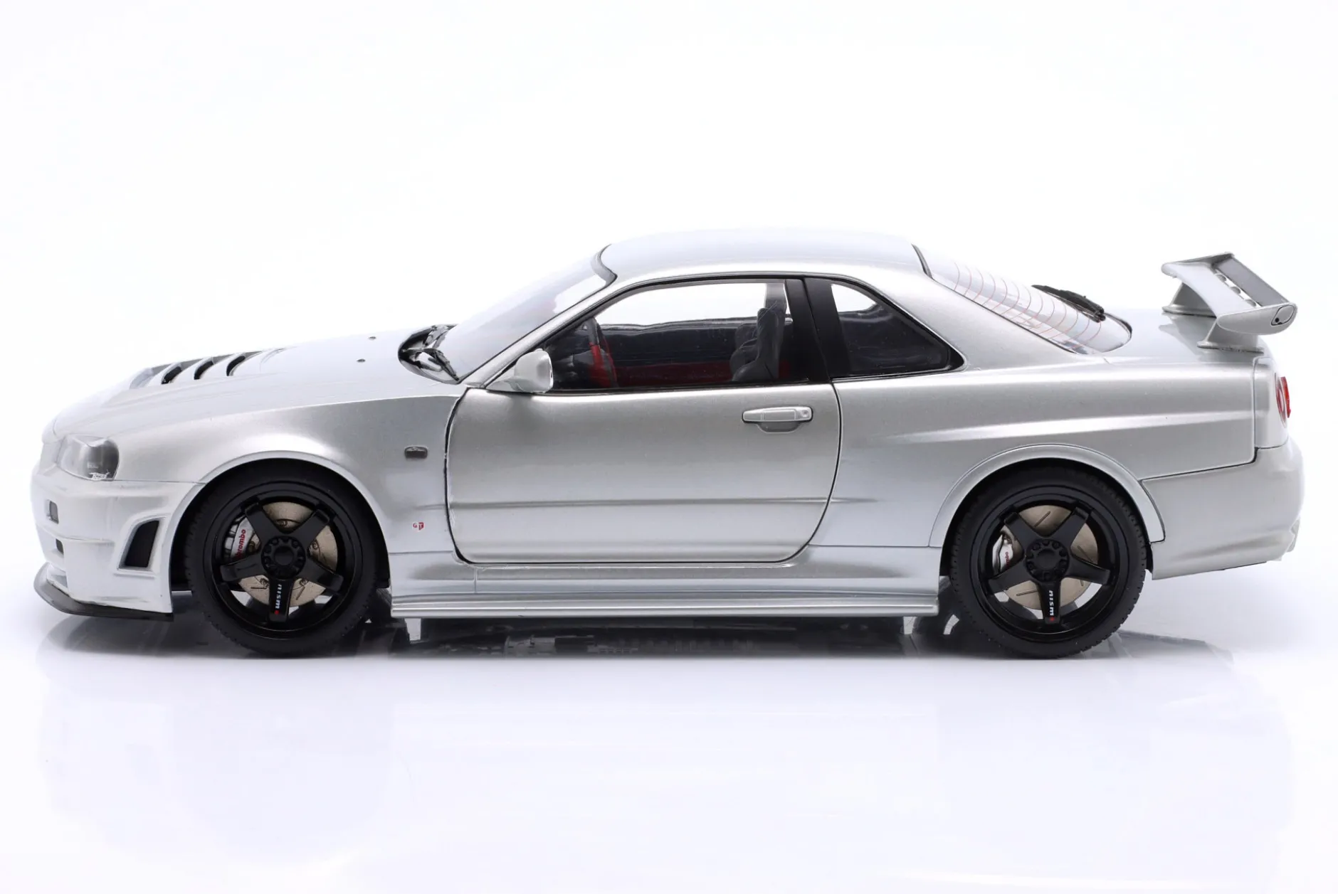 Nissan Skyline GT-R (BNR34) Z-Tune Baujahr 1999 silber 1:18 Solido