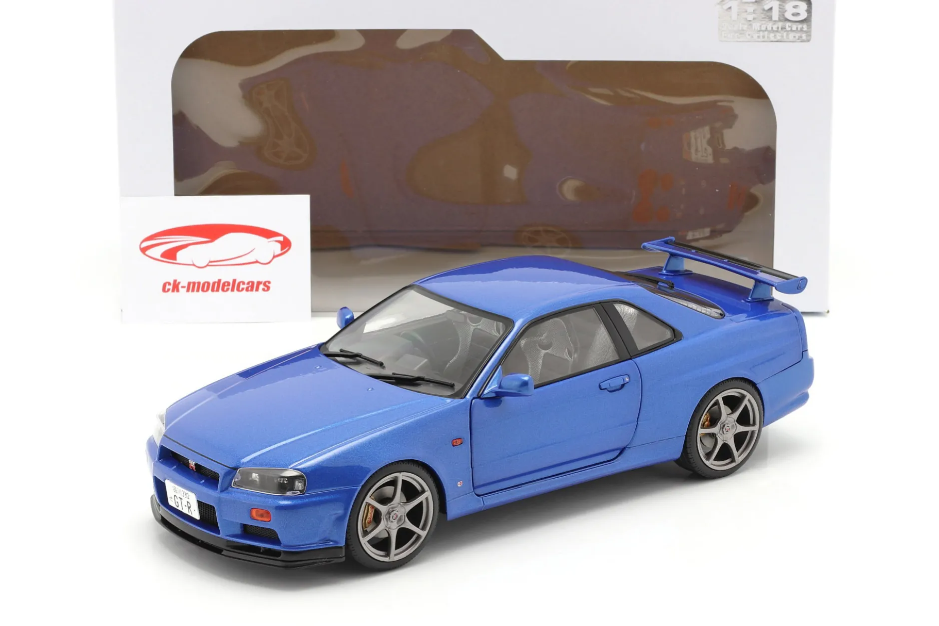 Nissan Skyline GT-R (R34) Baujahr 1999 bayside blau 1:18 Solido