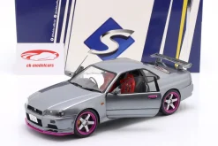 Nissan Skyline GT-R (R34) Baujahr 1999 silbergrau metallic / lila 1:18 Solido