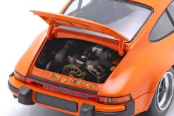 Porsche 911 Carrera Coupe 3.2 Baujahr 1983 orange 1:18 Minichamps
