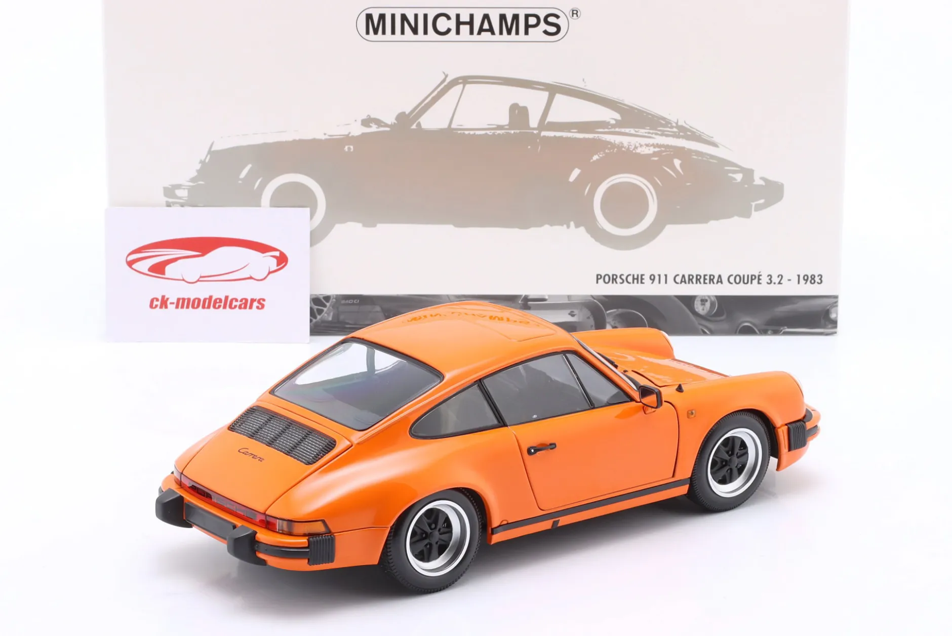Porsche 911 Carrera Coupe 3.2 Baujahr 1983 orange 1:18 Minichamps