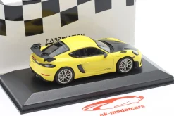 Porsche 718 (982) Cayman GT4 RS 2021 gelb / Neodym-Felgen 1:43 Minichamps