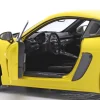 Porsche Cayman GT4 RS mit Weissach-Paket Baujahr 2024 gelb 1:18 Minichamps