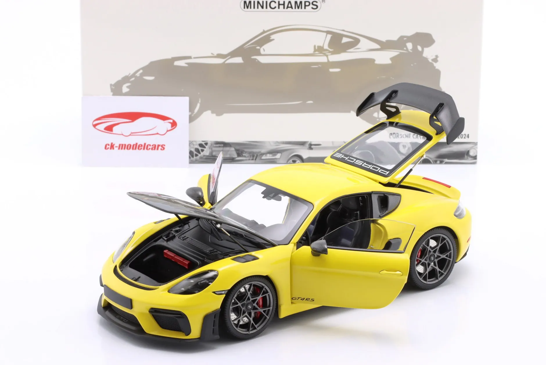 Porsche Cayman GT4 RS mit Weissach-Paket Baujahr 2024 gelb 1:18 Minichamps