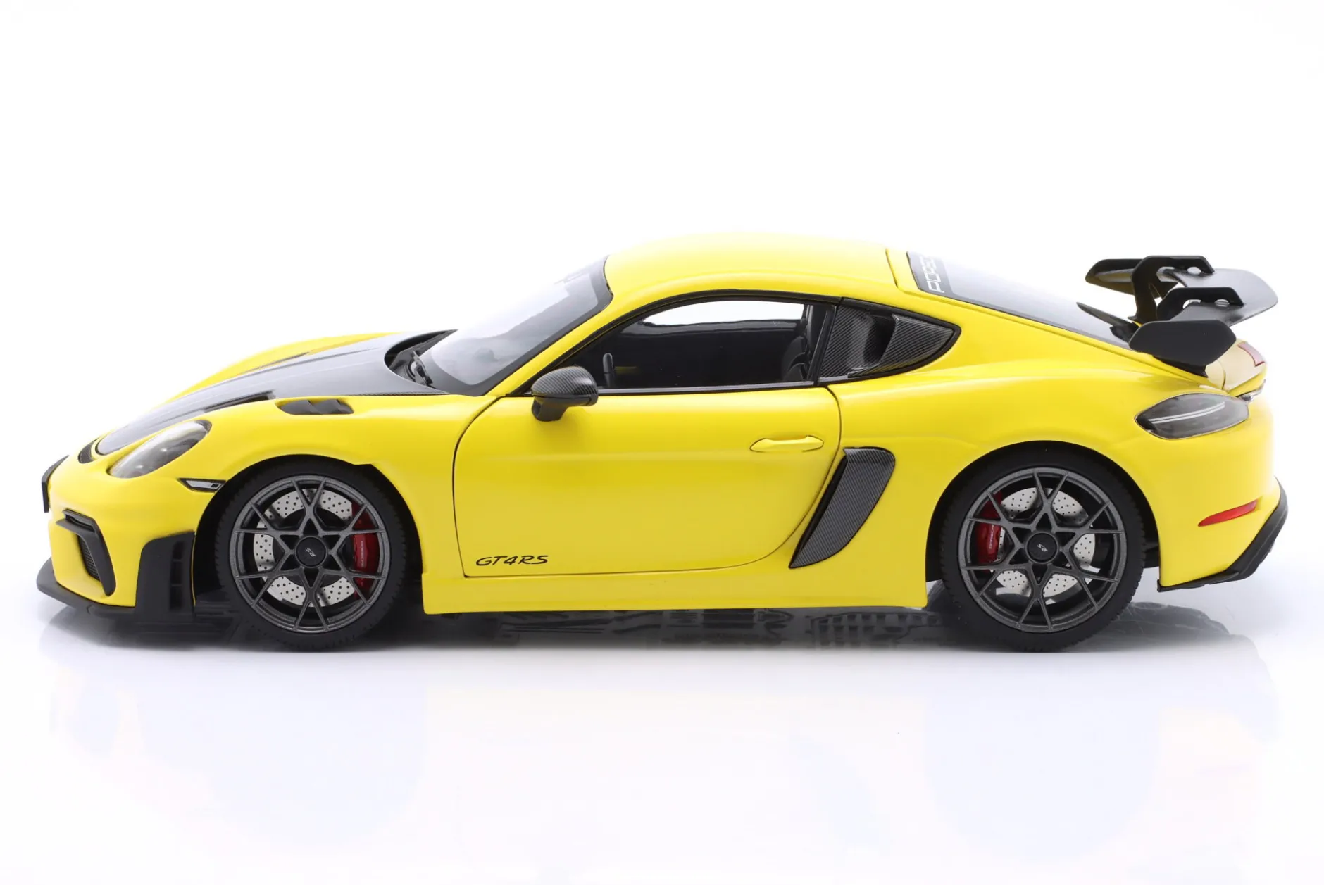 Porsche Cayman GT4 RS mit Weissach-Paket Baujahr 2024 gelb 1:18 Minichamps
