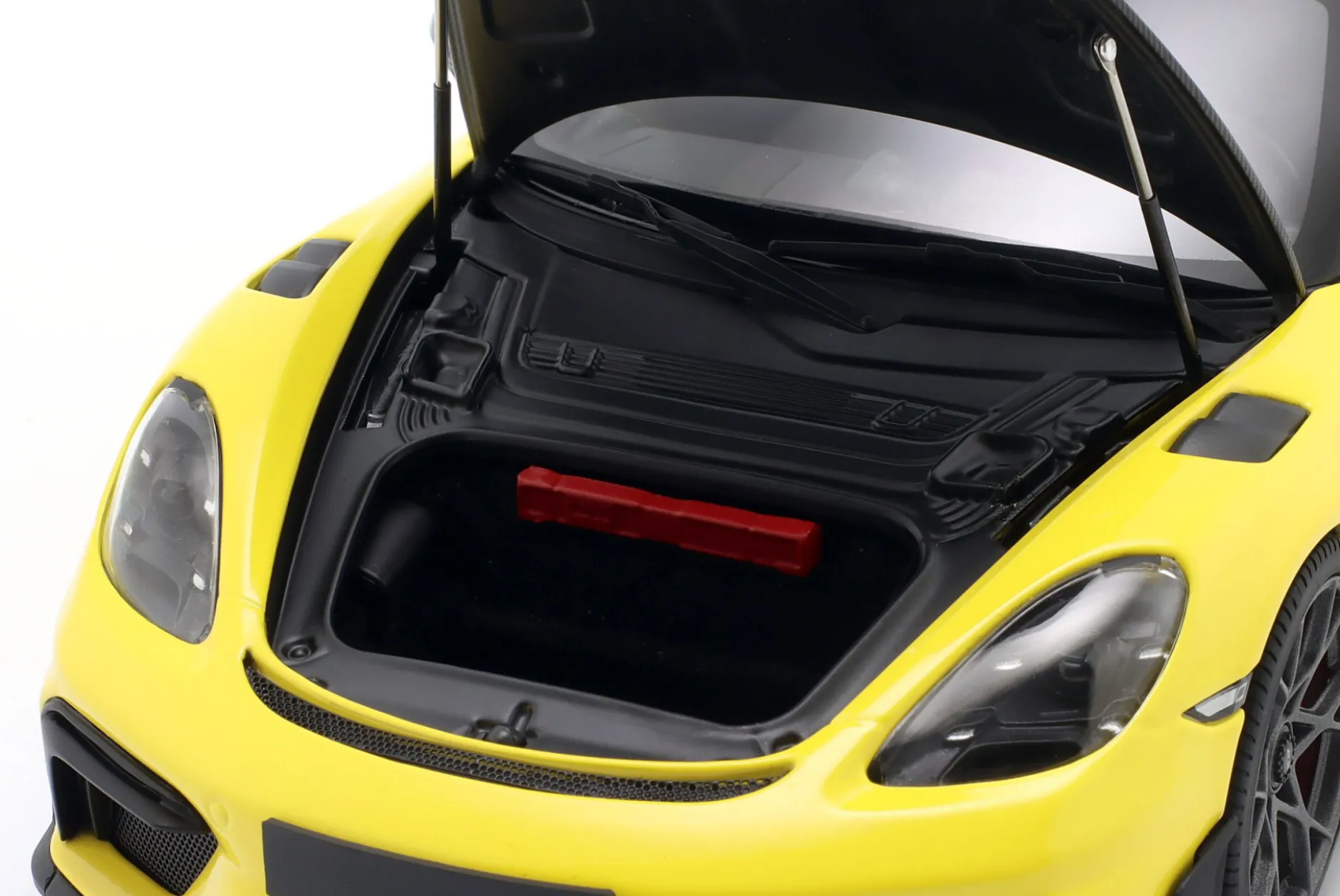 Porsche Cayman GT4 RS mit Weissach-Paket Baujahr 2024 gelb 1:18 Minichamps