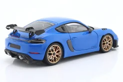 Porsche Cayman GT4 RS mit Weissach-Paket Baujahr 2024 blau 1:18 Minichamps