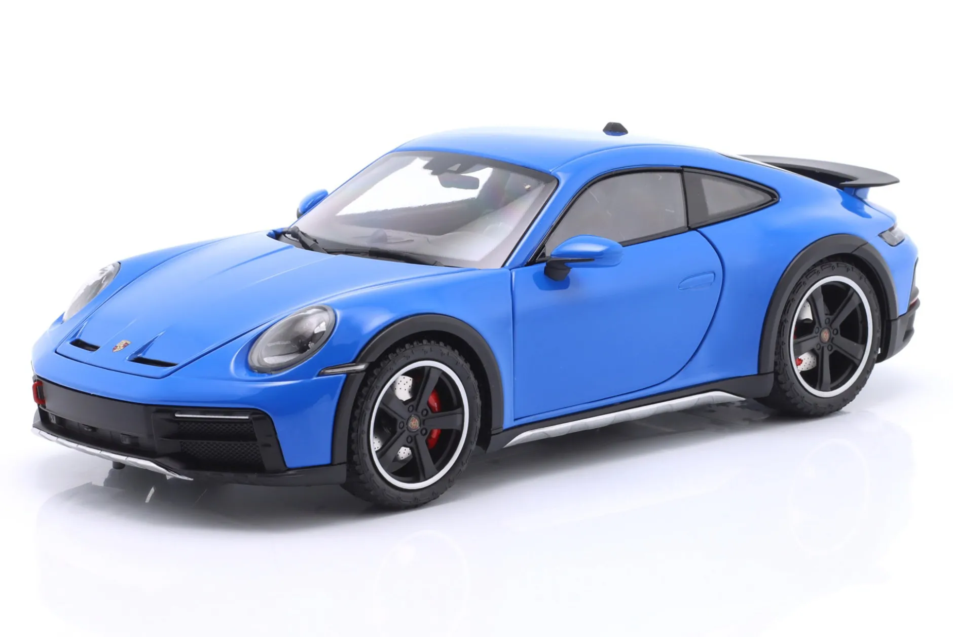 Porsche 911 (992) Dakar Baujahr 2022 blau 1:18 Minichamps