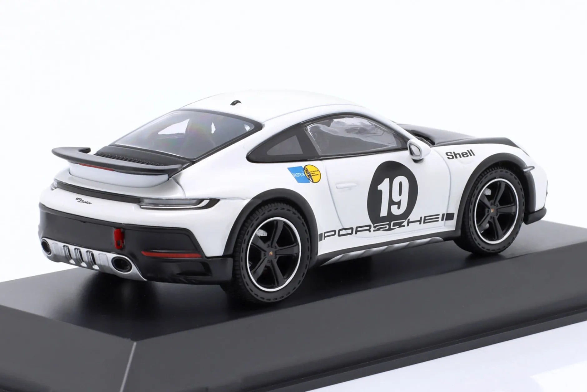 Porsche 911 (992) Dakar #19 Baujahr 2023 weiß / schwarz 1:43 Spark