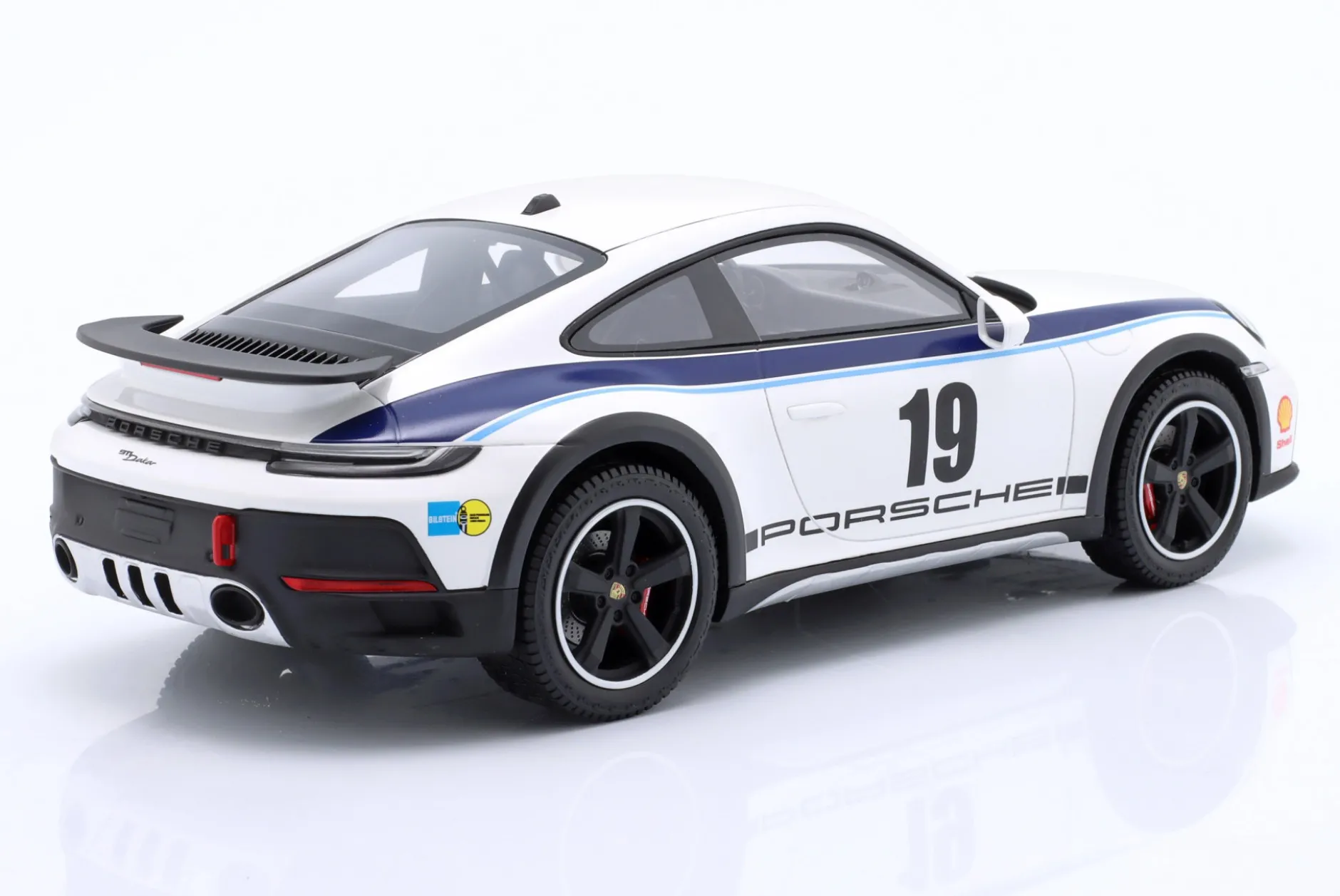 Porsche 911 (992) Dakar Rallye 1974 Design #19 weiß 1:18 Spark