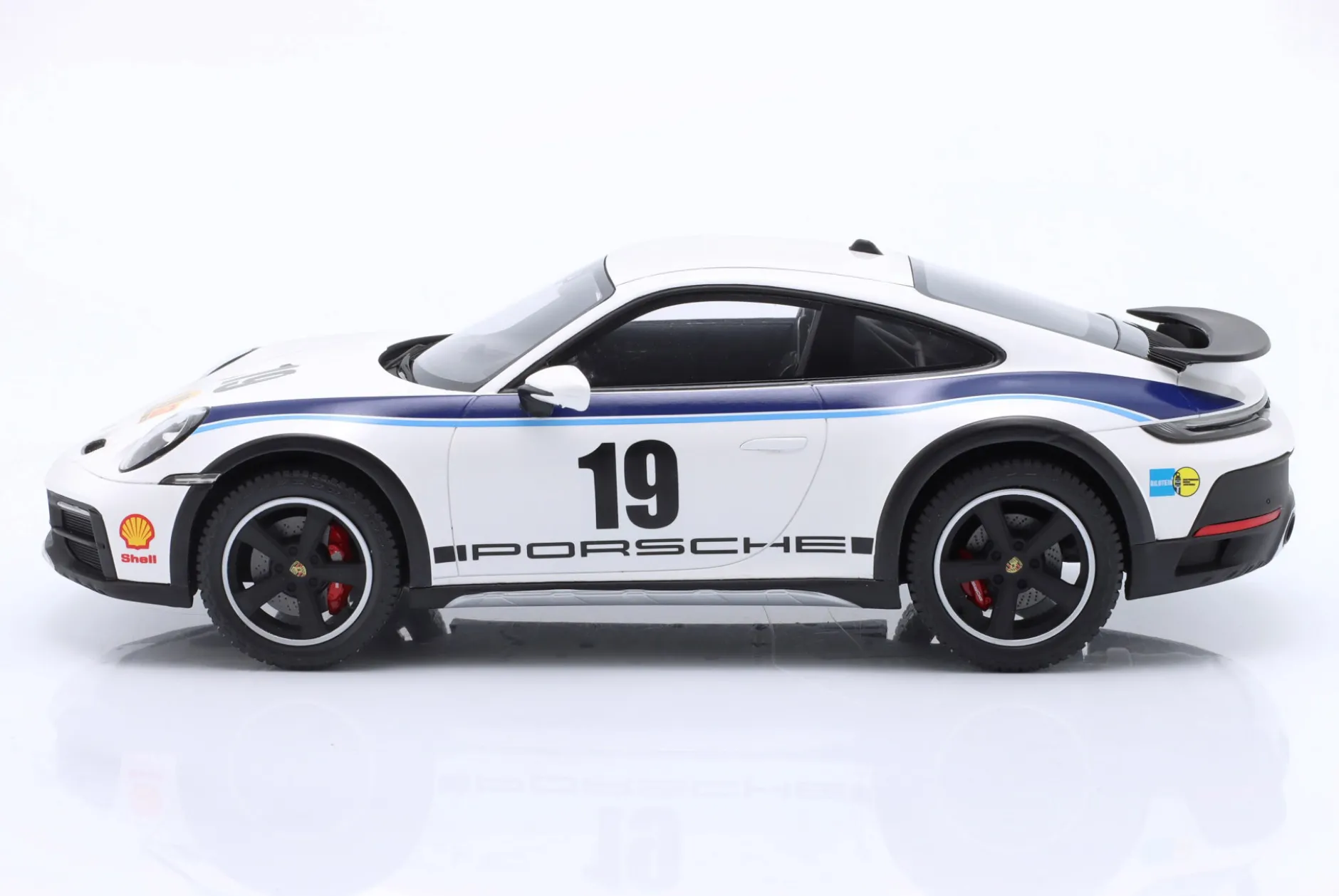 Porsche 911 (992) Dakar Rallye 1974 Design #19 weiß 1:18 Spark