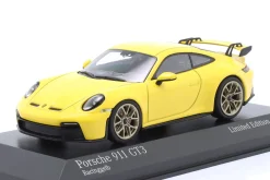 Porsche 911 (992) GT3 Baujahr 2020 racinggelb / goldene Felgen 1:43 Minichamps