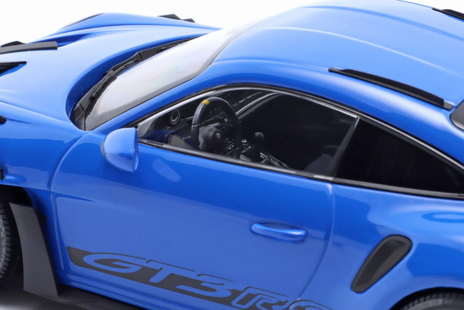 Porsche 911 (992) GT3 RS Baujahr 2023 blau / silberne Felgen 1:18 Minichamps
