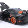 Porsche 911 (992) GT3 RS Baujahr 2022 schwarz / orange Felgen 1:18 Minichamps