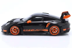 Porsche 911 (992) GT3 RS Baujahr 2022 schwarz / orange Felgen 1:18 Minichamps