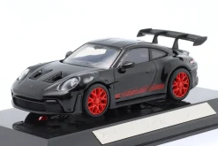 Porsche 911 (992) GT3 RS Baujahr 2022 schwarz / rote Felgen 1:43 Bburago