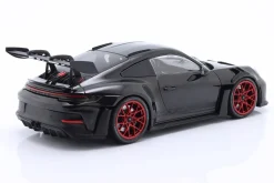 Porsche 911 (992) GT3 RS Baujahr 2023 schwarz / rote Felgen 1:18 Minichamps