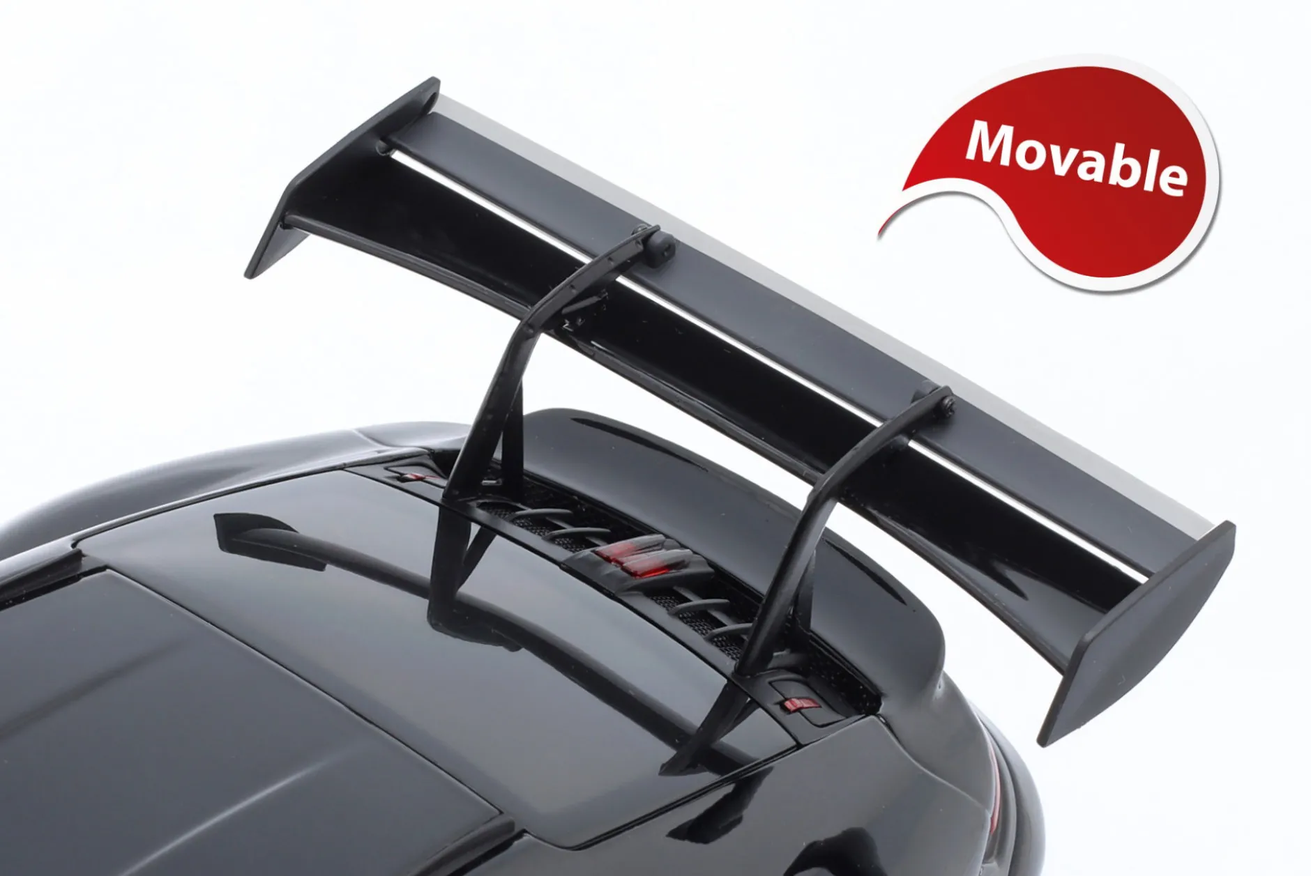 Porsche 911 (992) GT3 RS Baujahr 2023 schwarz / rote Felgen 1:18 Minichamps