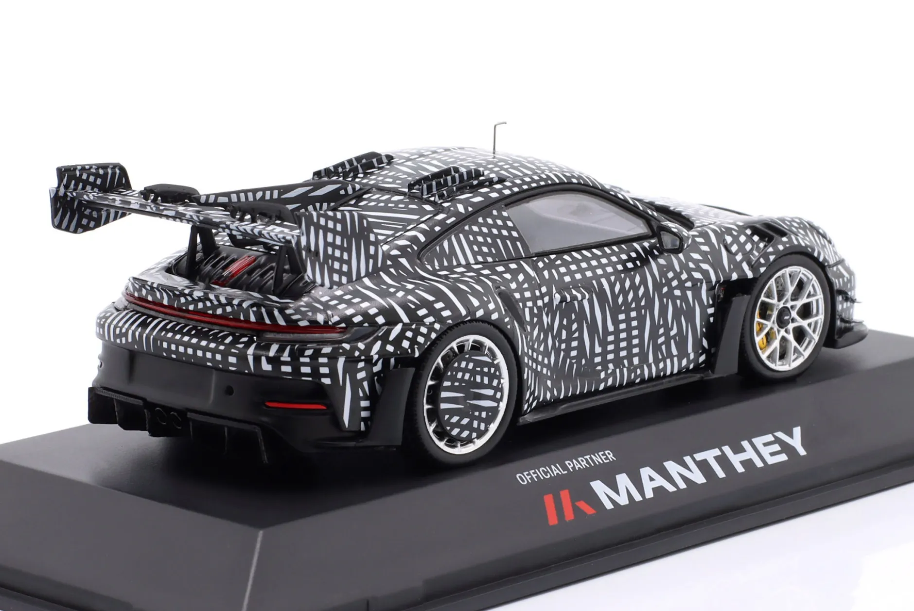 Porsche 911 (992) GT3 RS Manthey Kit 2024 schwarz / weiß 1:43 Spark