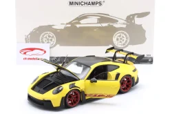 Porsche 911 (992) GT3 RS Weissach-Paket 2024 gelb / rote Felgen 1:18 Minichamps
