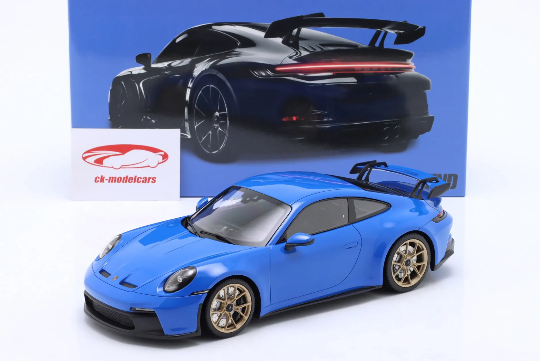 Porsche 911 (992) GT3 2021 sharkblue / goldene Felgen 1:18 Minichamps