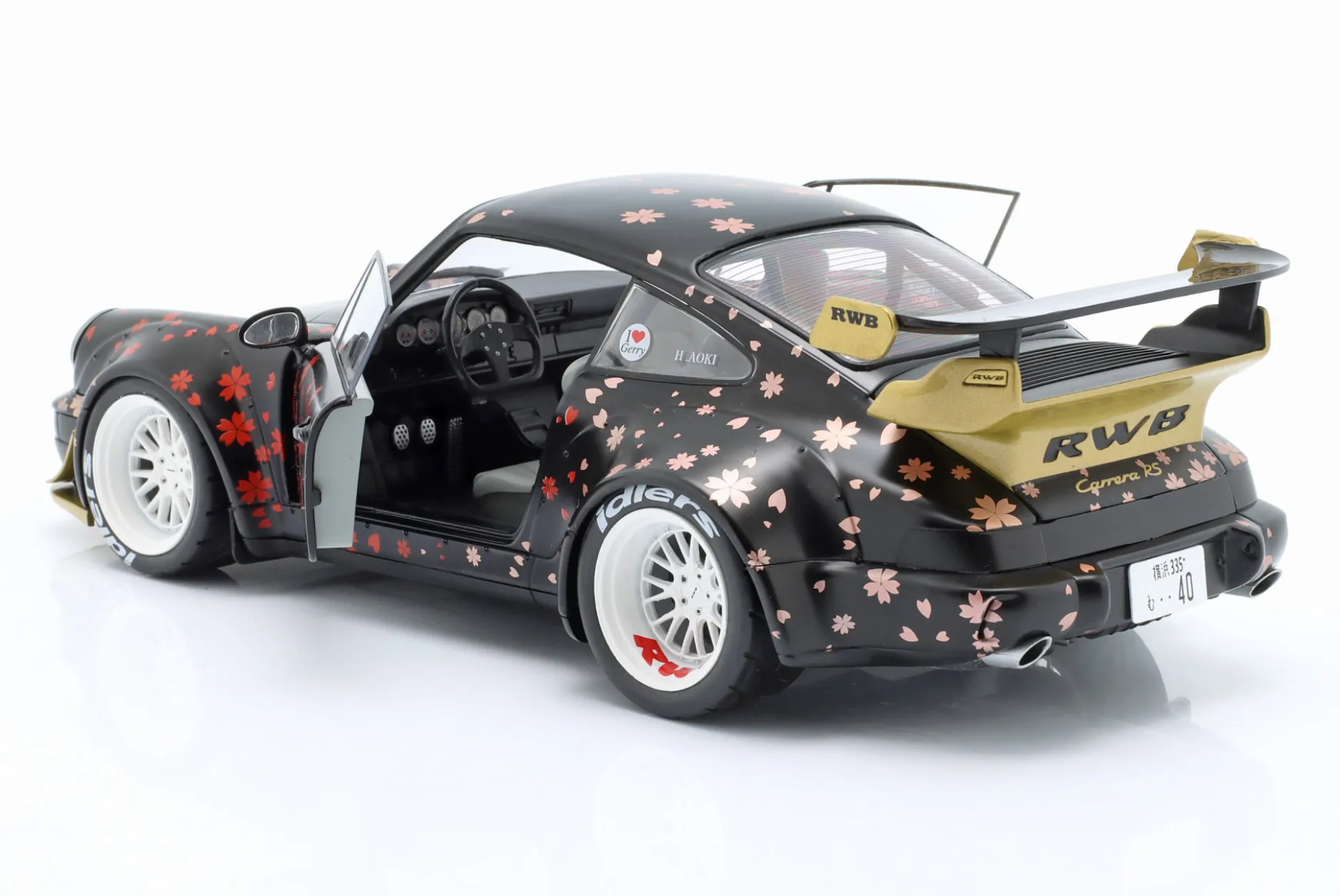 Porsche 911 (964) RWB Rauh-Welt Aoki 2021 schwarz mit Dekor 1:18 Solido