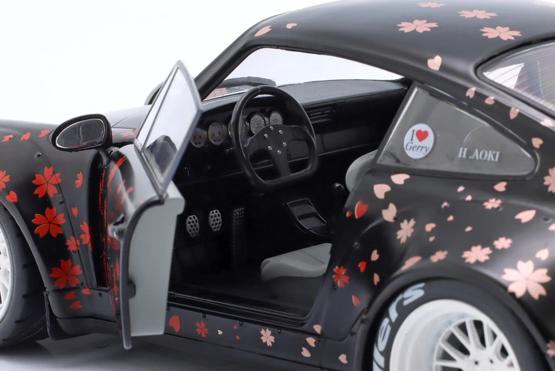 Porsche 911 (964) RWB Rauh-Welt Aoki 2021 schwarz mit Dekor 1:18 Solido