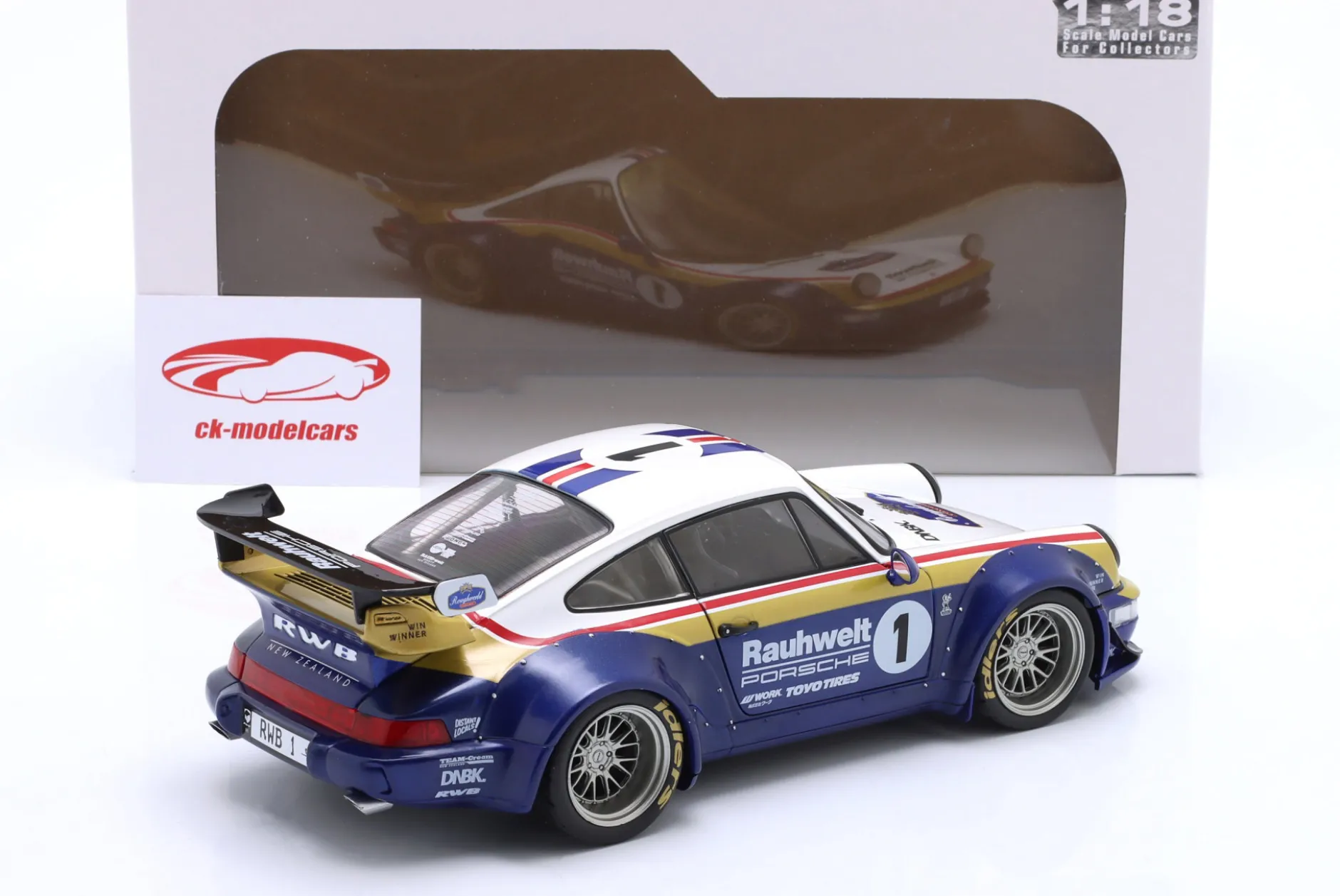 Porsche 911 (964) RWB Rauh-Welt 2022 blau / weiß / rot / gold 1:18 Solido