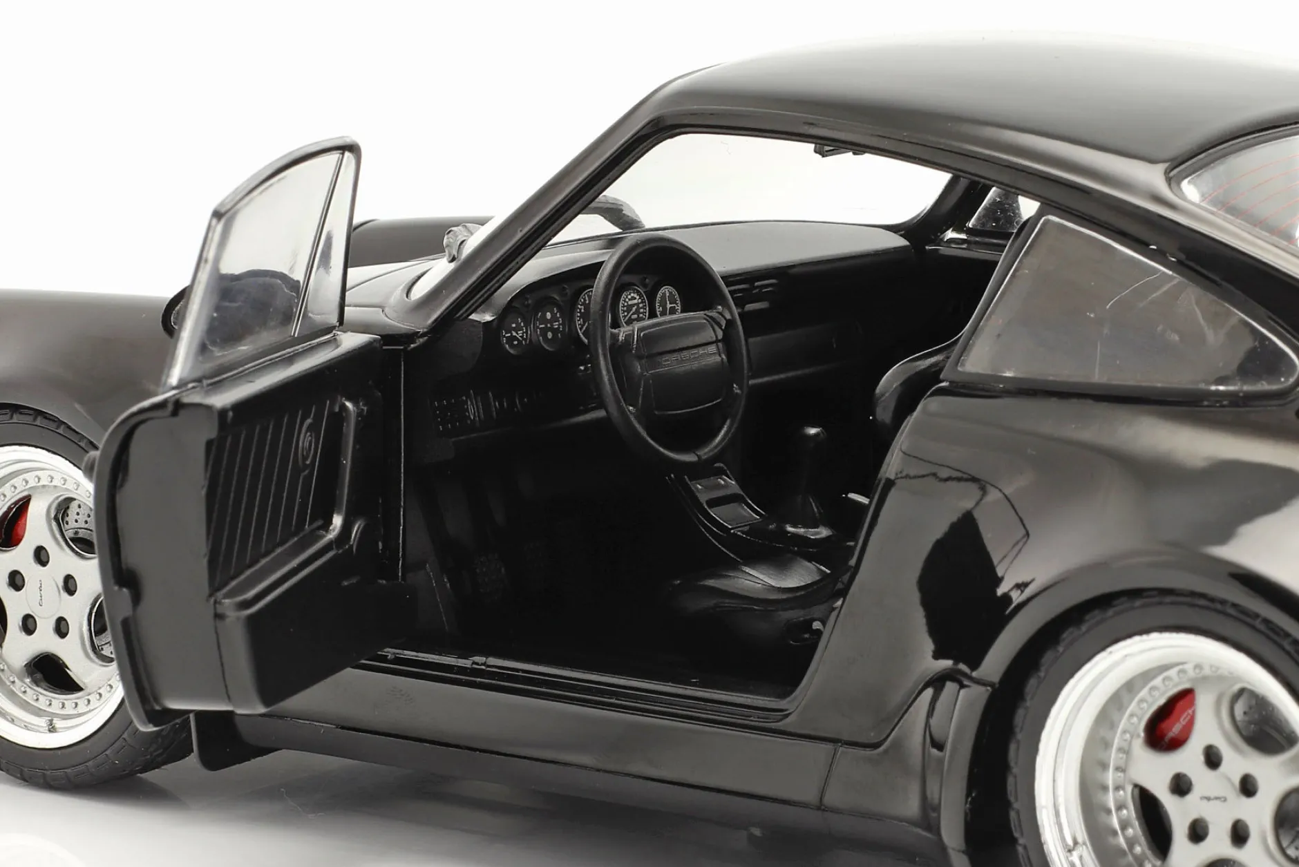 Porsche 911 (964) Turbo Baujahr 1990 schwarz 1:18 Solido