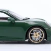 Porsche 911 (992) Turbo S Coupe Sport 2024 grün / goldene Felgen 1:18 Minichamps