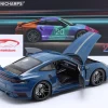 Porsche 911 (992) Turbo S Sport Design Baujahr 2021 oslo blau 1:18 Minichamps