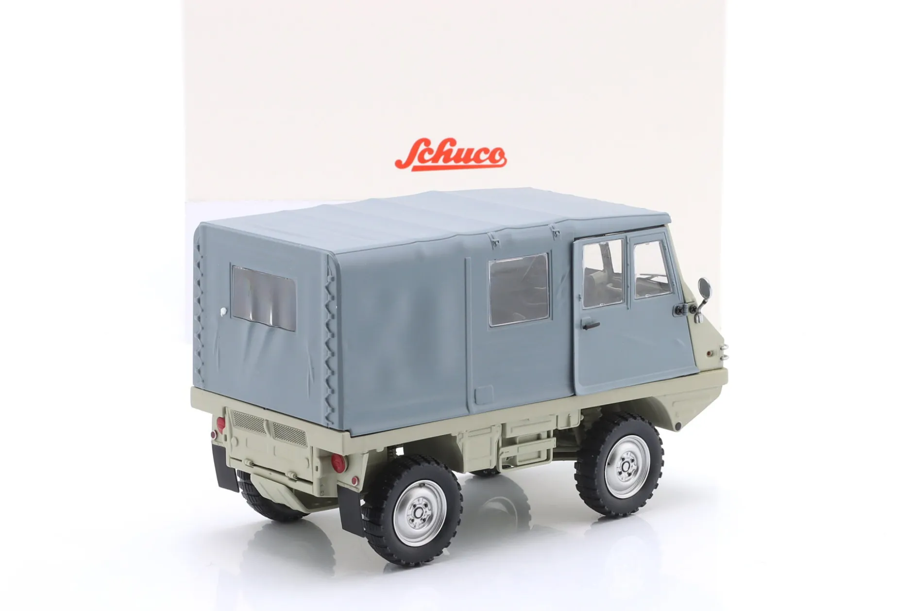 Steyr-Puch Haflinger 4x4 beige / grau 1:18 Schuco